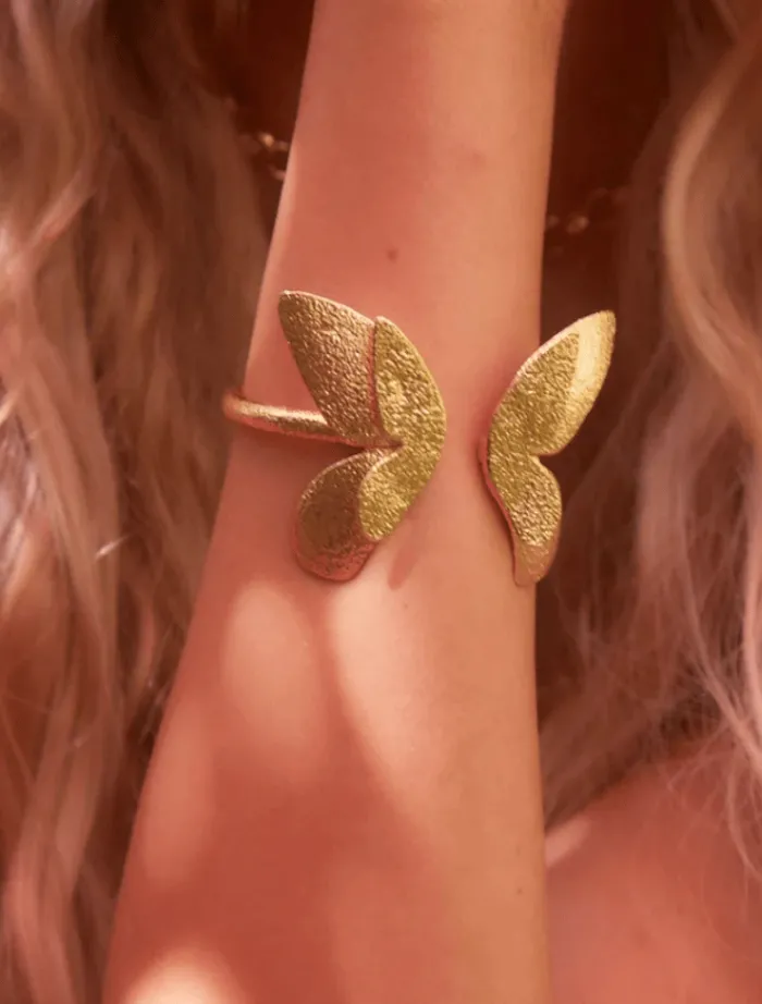 butterfly_effect_cuff__go_3.webp Emma Pills Butterfly Effect Cuff - Gold Fearless Finish< Bracelets