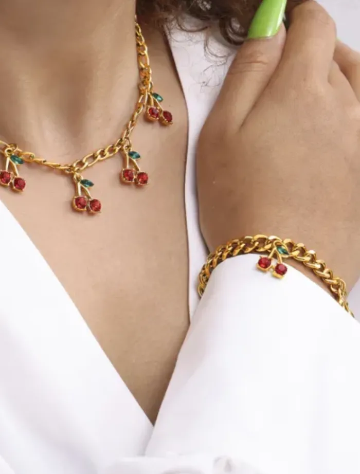 cherry_cola_bracelet__gol_1.webp Insurge Clothing Cherry Cola Bracelet - Gold< Bracelets